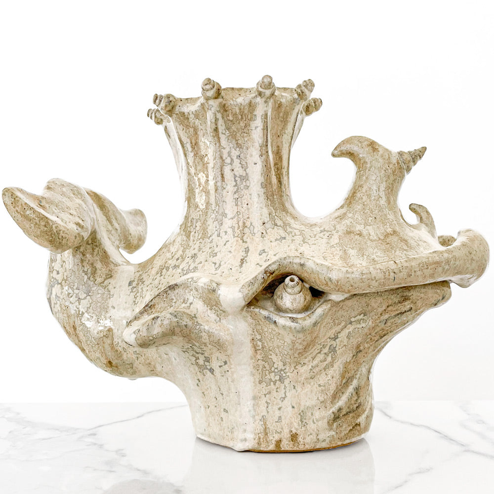 Unique beige whale sculpture for home decor