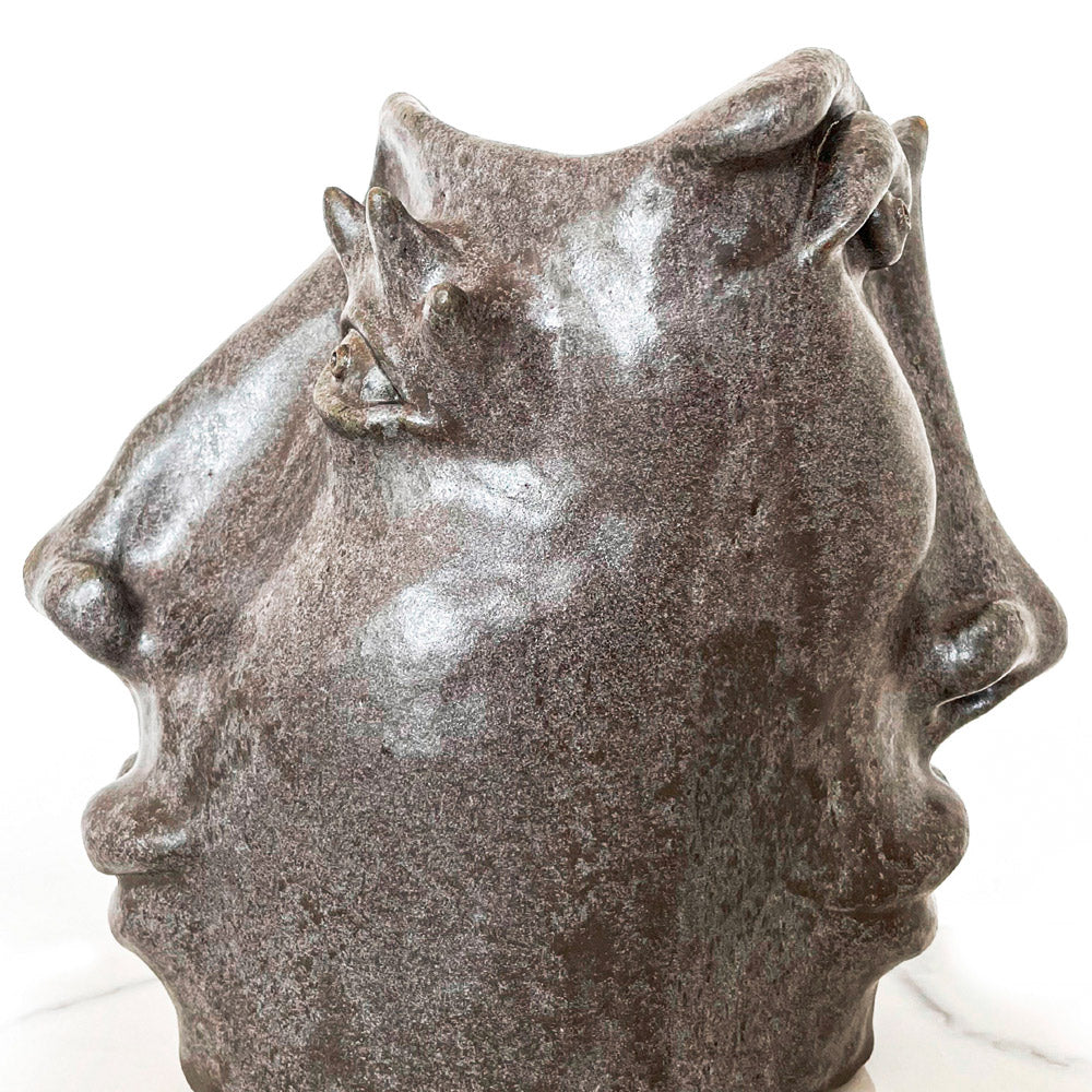 Unique grey face sculpture for home decor