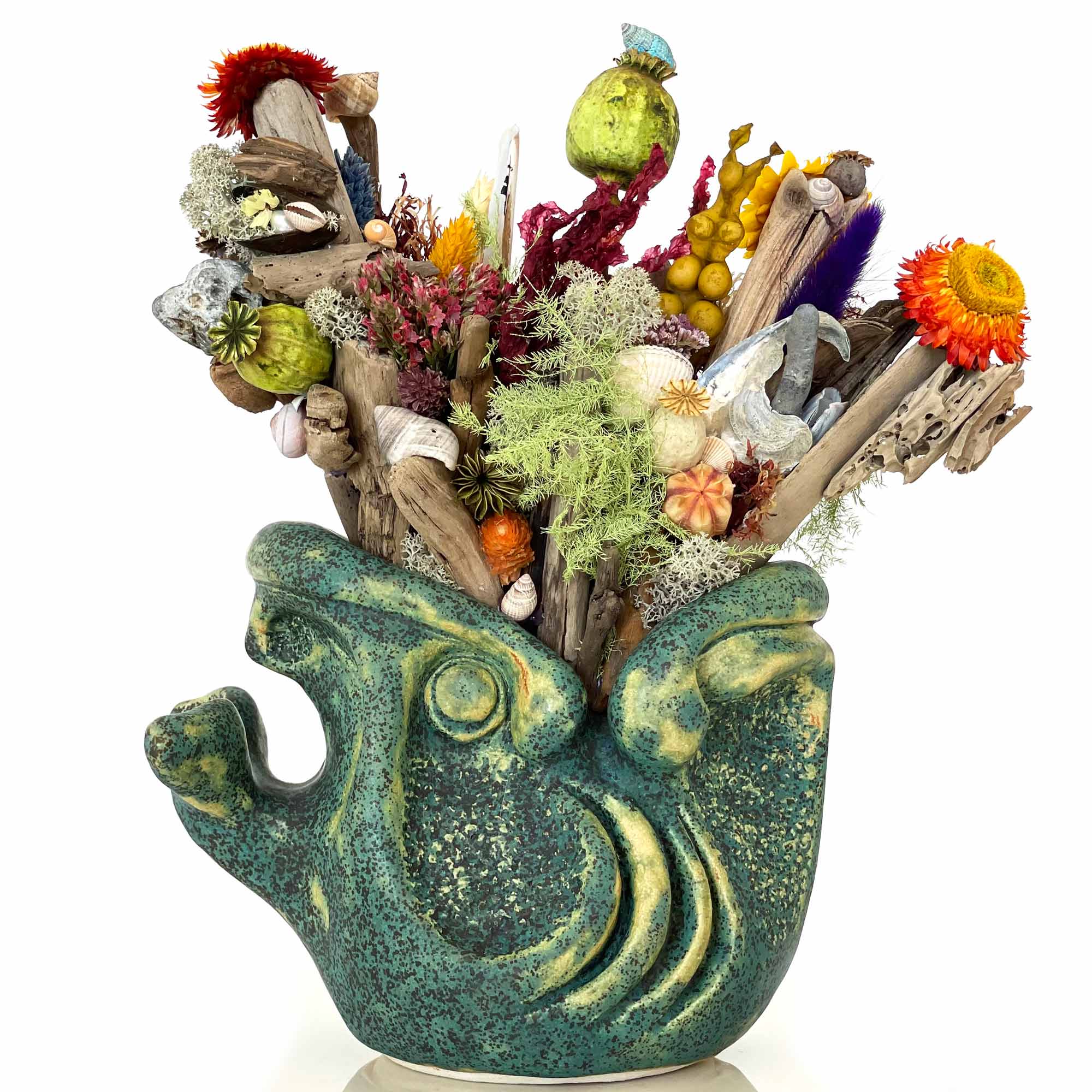 Grøn nuttet fiskeskulptur hos restaurant Lumskebugten. Skulpturen er lave af Michala Brincker